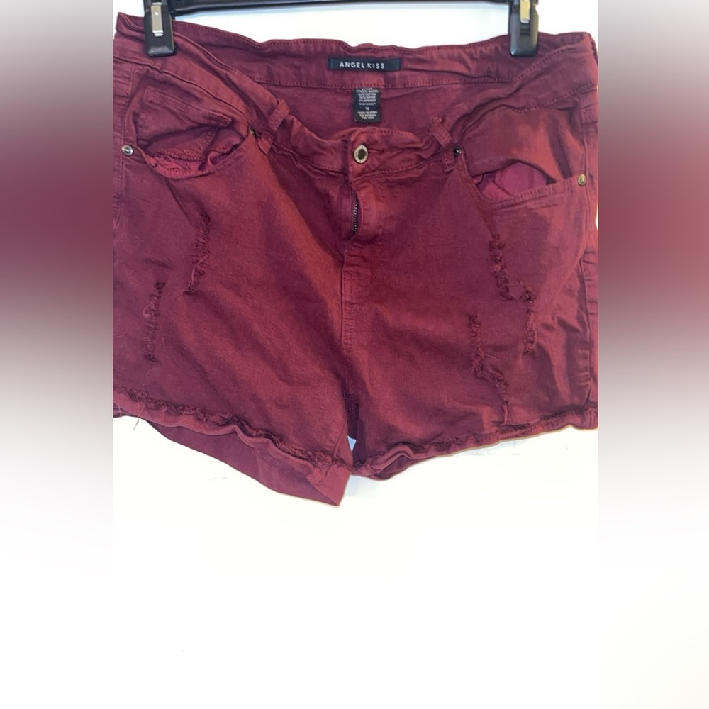 Red distressed shorts